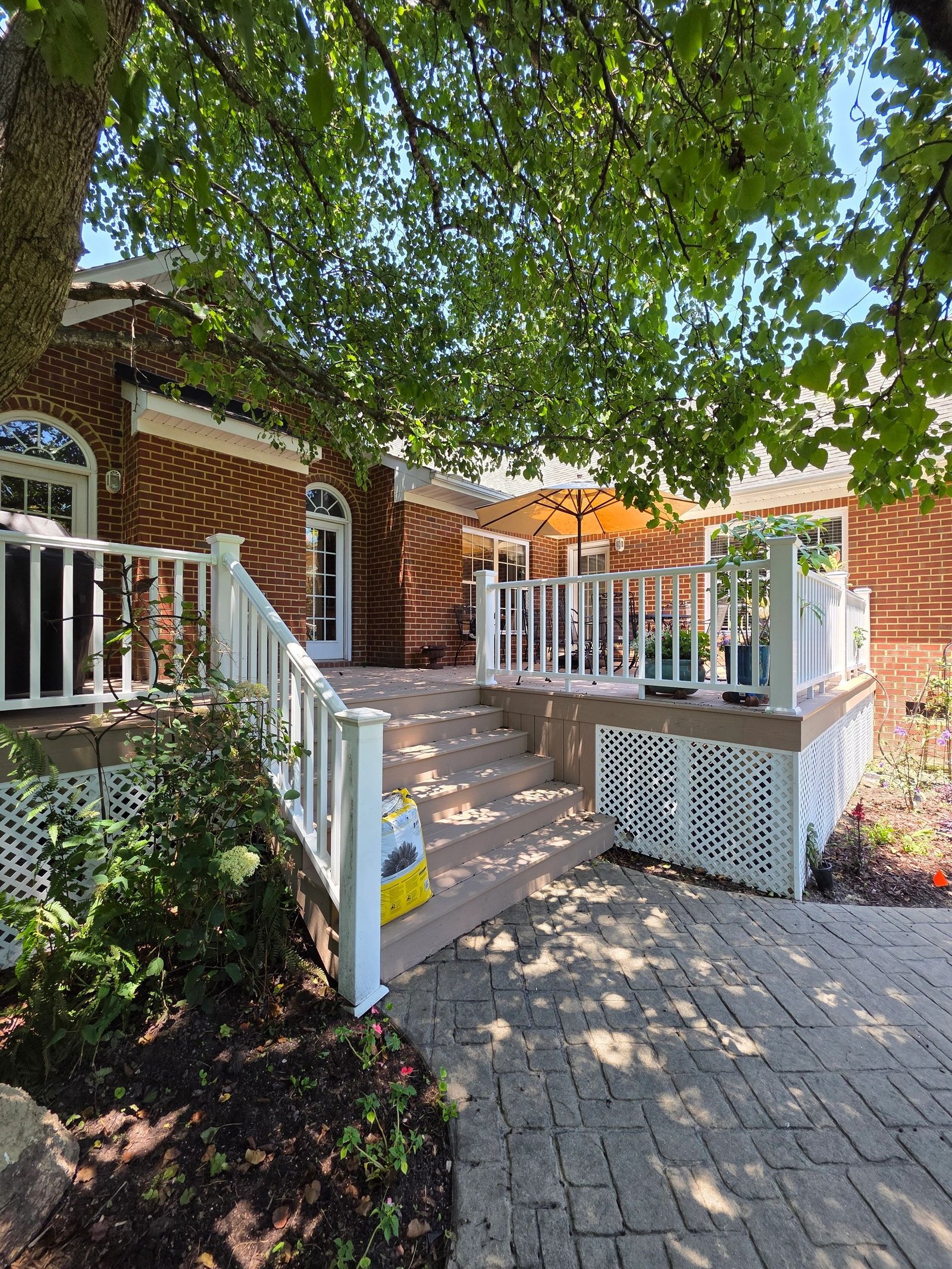 Serenity deck project in Smithfield, TimberTech Brownstone PVC decking