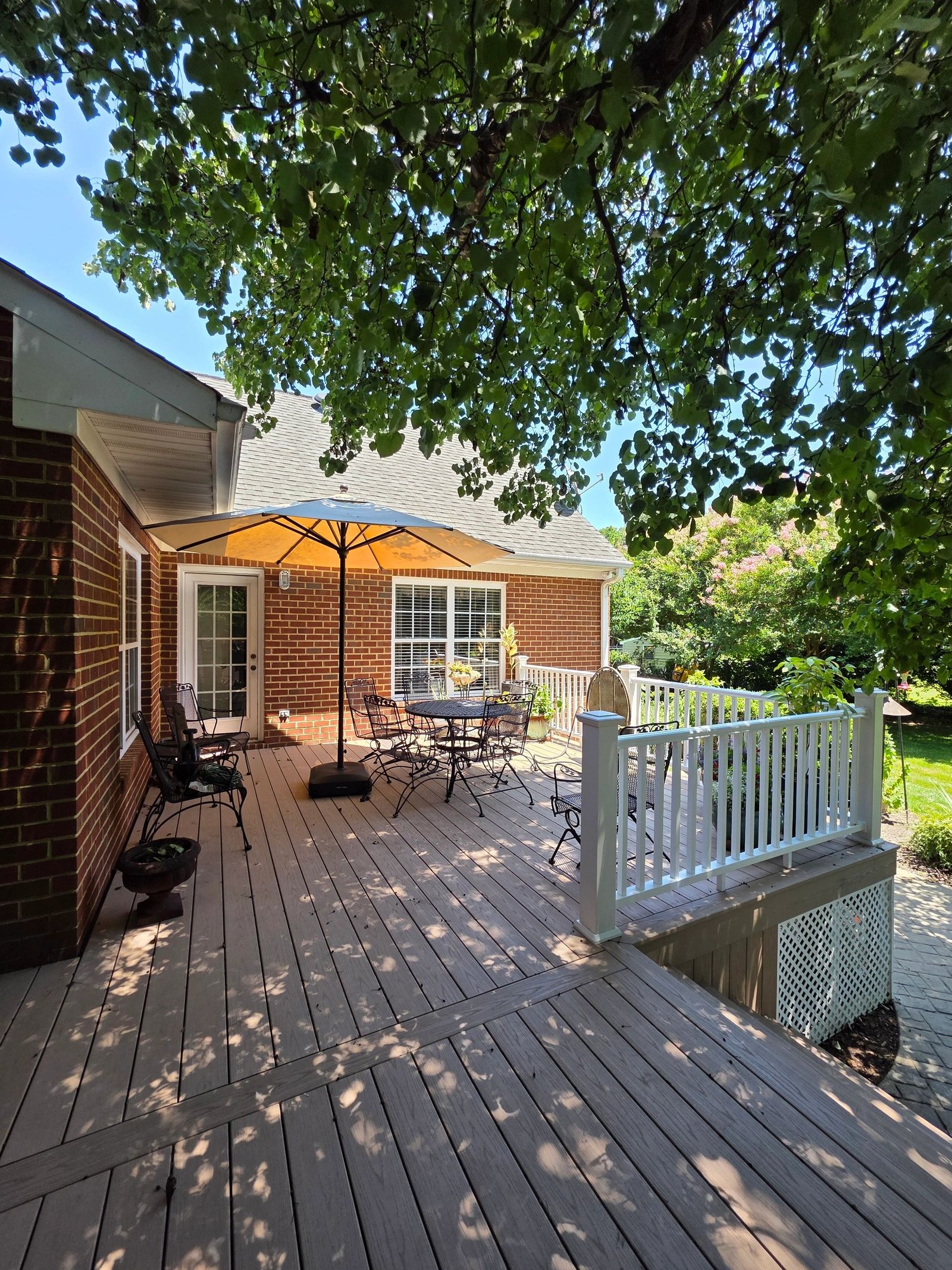 Serenity deck project in Smithfield, TimberTech Brownstone PVC decking