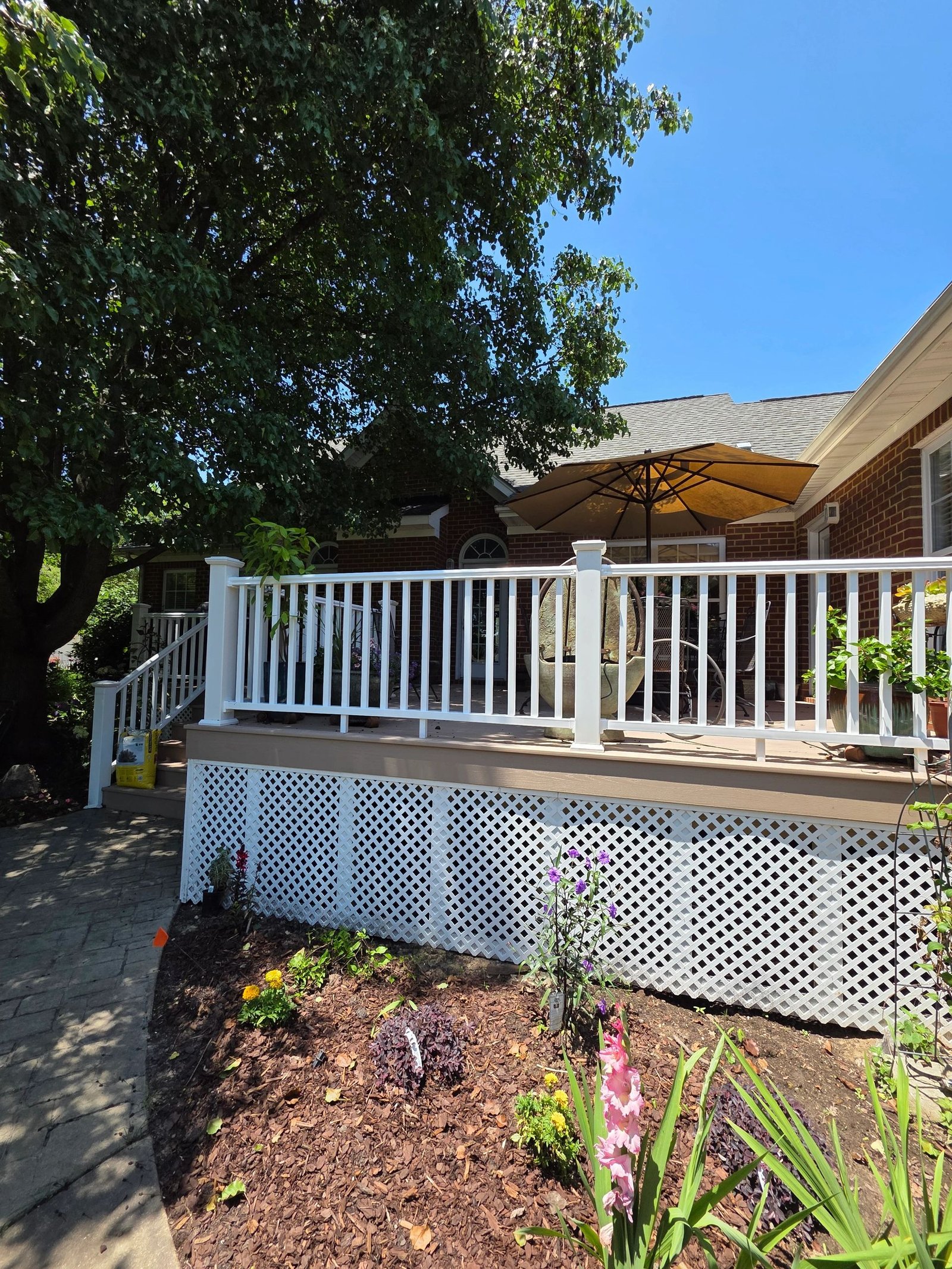Serenity deck project in Smithfield, TimberTech Brownstone PVC decking