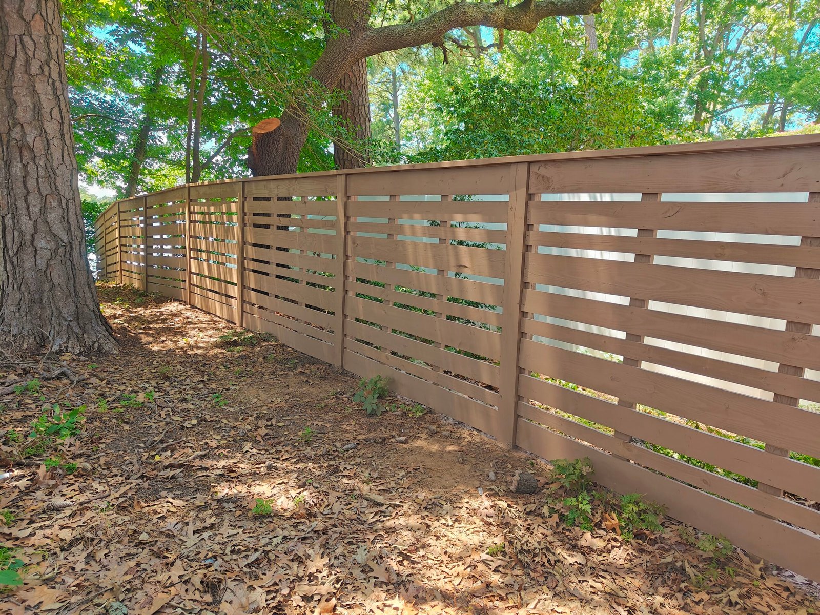 Custom horizontal-slat fence project in Lake Shores, Virginia Beach, VA