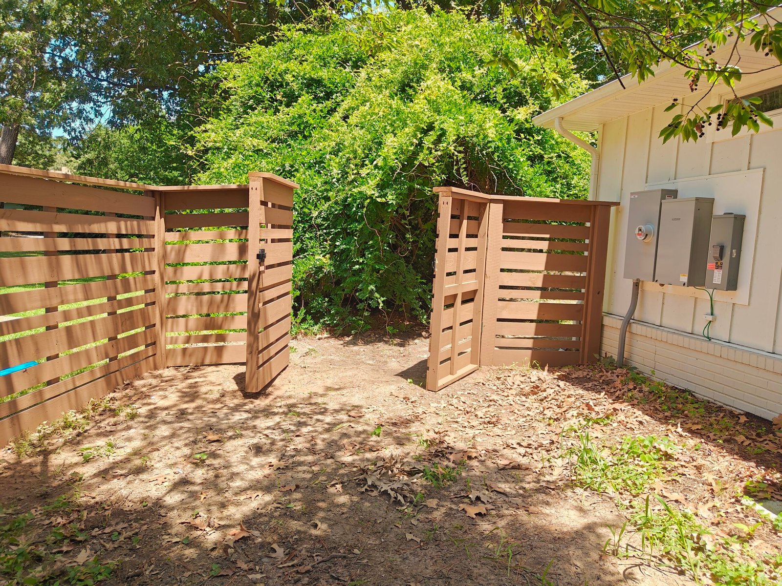 Custom horizontal-slat fence project in Lake Shores, Virginia Beach, VA